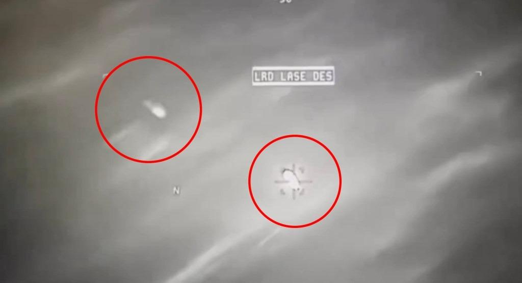 Thermal footage of a Hellfire missile striking a UAP with no effect.
